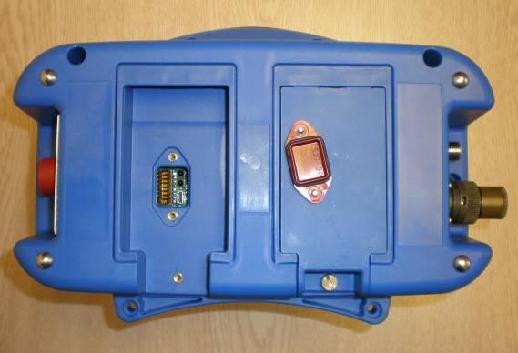 The spare battery storage compartment is the battery compartment with USB/IR cover inside the battery compartment.