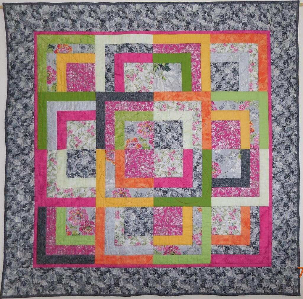 SQUARE RIPPLE DESIGNED, PIECED AND QUILTED BY: VALERIE