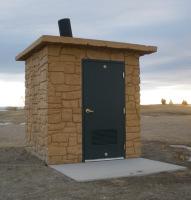 The toilets are precast in several sections and assembled into a complete one piece unit.