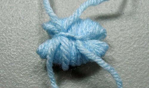 And then knot it. If you have a friend close by, ask them to put a finger on the knot.