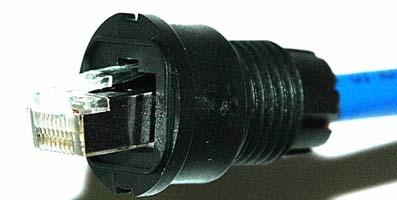 ) approximately ½ and insert the cable through the sealing nut, screw nut, and housing.