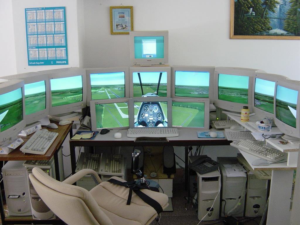 Simulations: Interface Picture of Microsoft Flight Simulator on 9 computers and 13 monitors.