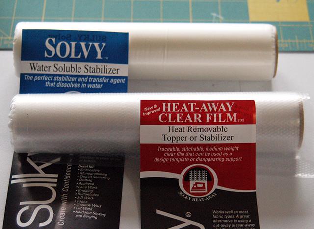 Sulky offers two choices, one washes away, Solvy, while the other is removed by the heat of the iron, Heat-Away Clear Film.
