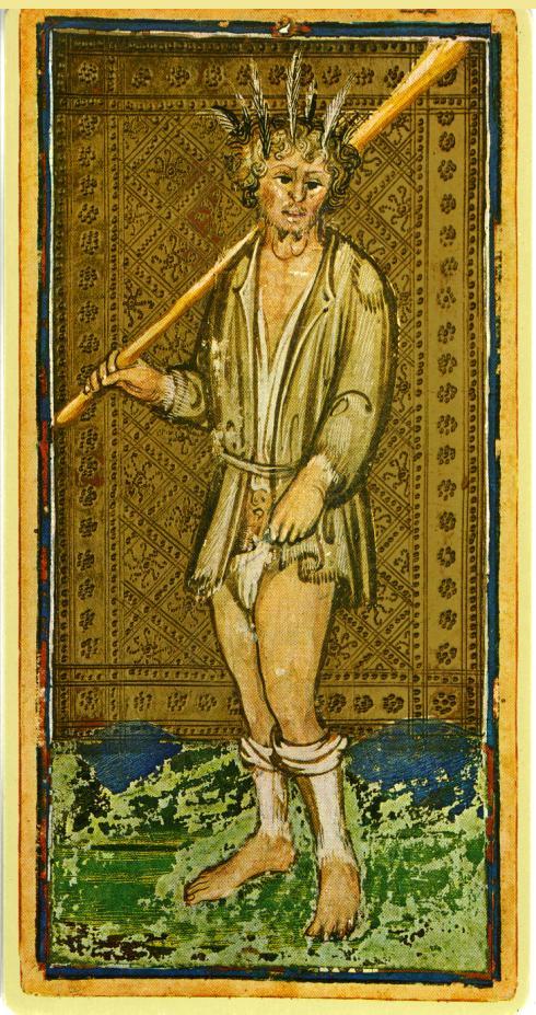 He has feathers in his hair and he is clothed in filthy rags. Early writers on the Tarot gave the meaning of this card as madness and folly.