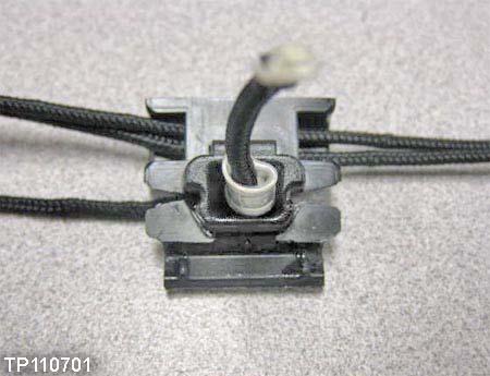 32. Apply super glue or equivalent adhesive to ALL tether cord clips where shown in Figure 31. 33.