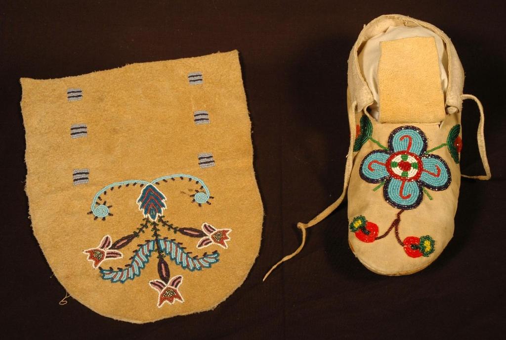 Two-piece, hard-soled moccasins were made from a rawhide sole that was sewn to a leather upper. The two pieces were connected from the inside and then turned out.
