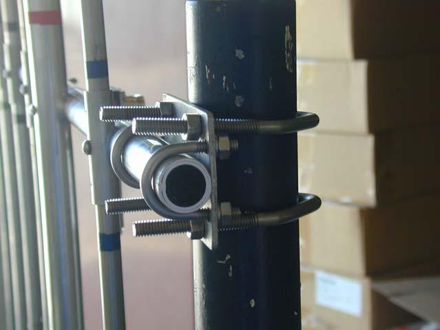 vertical pipe mast using large U-bolts Attach
