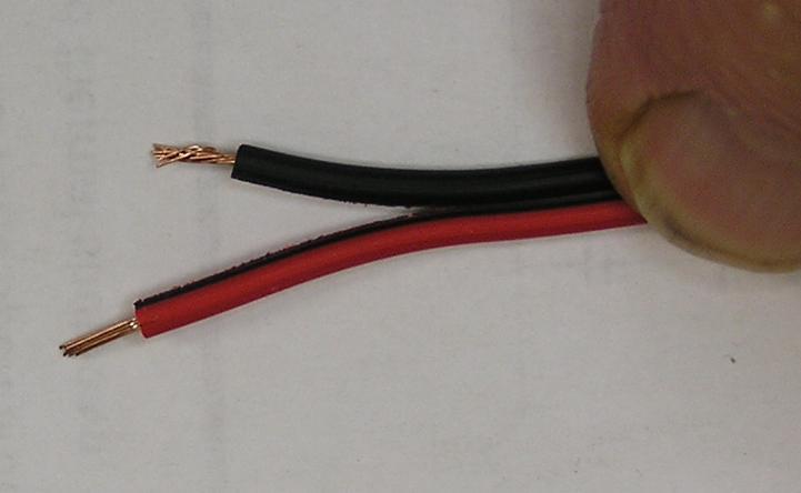 contact of the switch with the new red wire.