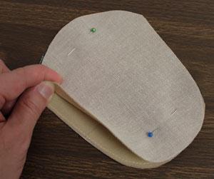 Sew a 1/8" seam along the side and bottom edges. Leave the top edge open.