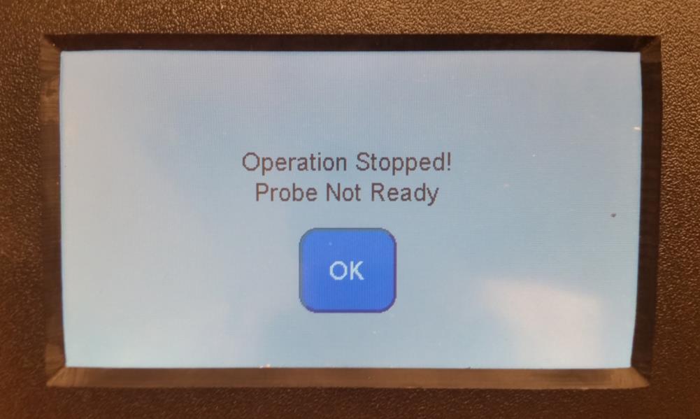 While running the Center Finder function, the Touch Probe moves with the CNC machine, but it is not registering contact with the material OR The Touch-Screen Display is displaying this message when