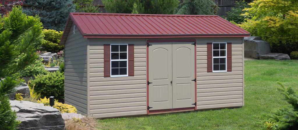 red metal roofing, clay siding, red trim, and red shutters This ranch style vinyl shed makes a great complement for modern homes.