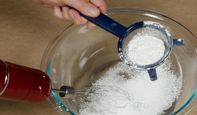 amount of water in your mixing container. Ensure there is headroom for mixing. Slowly sprinkle the Tutti Powder into the water while mixing with a whisk or hand-held electric mixer.