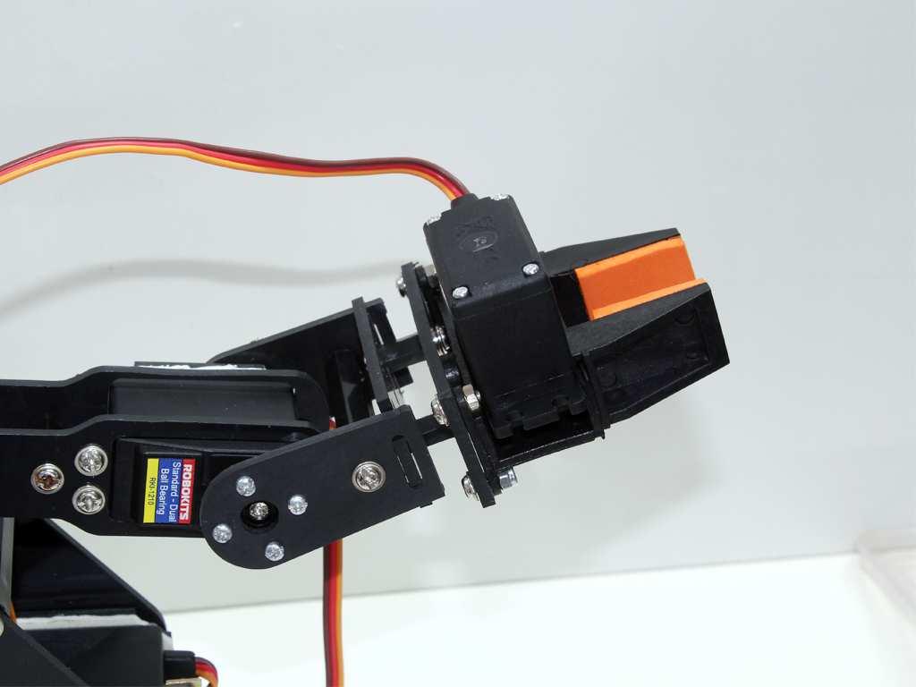 When the gripper servo is on top, arm may become a little un-stabilised when extended but this allow