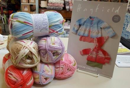 retails for $6.50 per skein! Pictured is the pattern for a hooded and non-hooded cardigan.