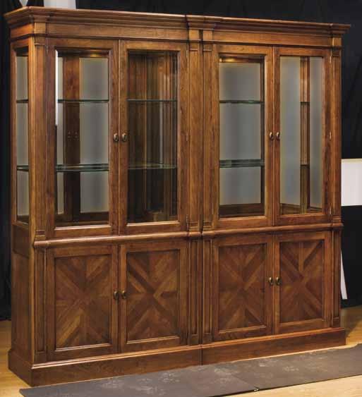 S t i c k l e y C l a s s i c s 53390 Oxford Display Cabinet H86 W47¼ D19 Distinctive molding detail at top, on pilasters, and above wood doors. Two glass doors above and two wood doors below.
