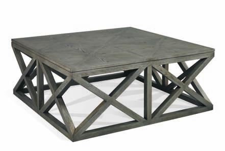 22 This large scale ash cocktail table provides a casual aire with its French industrial styling. The antiqued silver finish adds a shimmer to the casual open grained nature of ash.