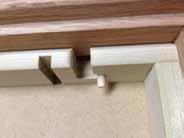 A 3/8 length of 1/4 dowel can now be inserted in the frame side peg hole.