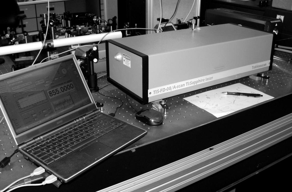 With other optical sets detuning of the Ti:Sapphire laser output line was available within 700 1100 nm range.