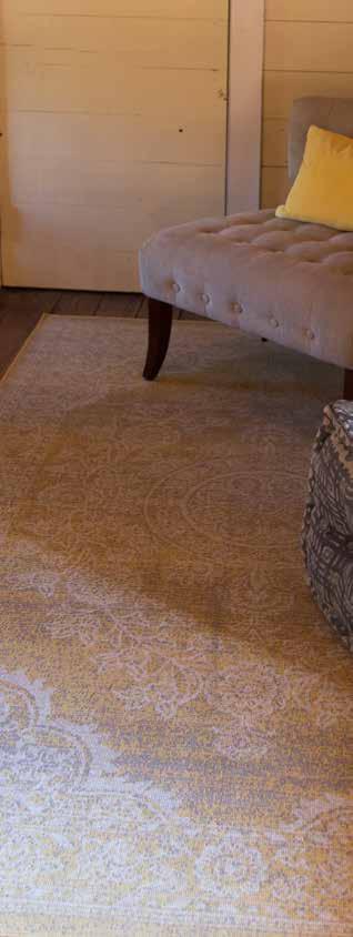 THATCHER The Thatcher Collection is a grouping of power loomed rugs woven in a zero-pile construction to lend it a distressed look.