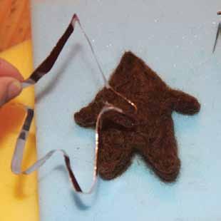 felting around the edges, near the metal mold, don t