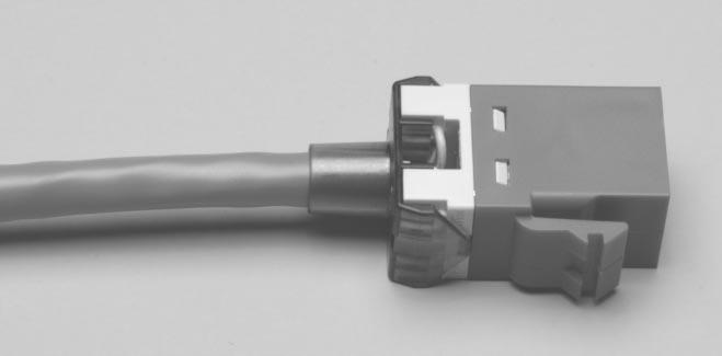 For unshielded jack connectors, position the strain relief over the connector and snap into place. Refer to Figure 14. 20.