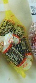 Mesh Bag Filled With 5 Tootsie Roll Midges Mesh Bag, 5 Piece, Label, Round, Cylinder, Tootsie Roll Midge Colors: Gold Label, White Label, Gold, Red, White, Yellow, Black Mesh Bag Imprint Information: