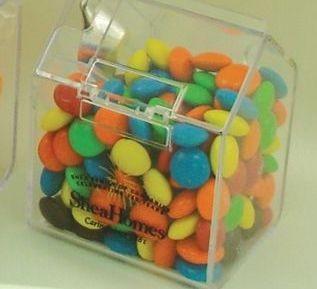 3-3/8"x2-1/4"x3-1/2" Small Candy Bin Container (Empty) 3-3/8"x2-1/4"x3-1/2", Small Candy Bin, Plastic, Flip Lid, Empty Colors: Clear Plastic Imprint Information: 1-1/4"X1-1/4" imprint area 150 $2.