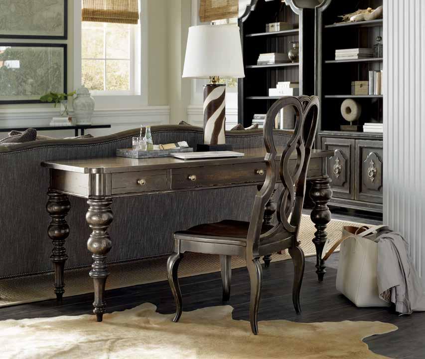 or entry hall. The Auberose writing desk, available in the charcoal and antique white finishes, can enhance any space in your home with its gracefully shaped legs and lithe form.