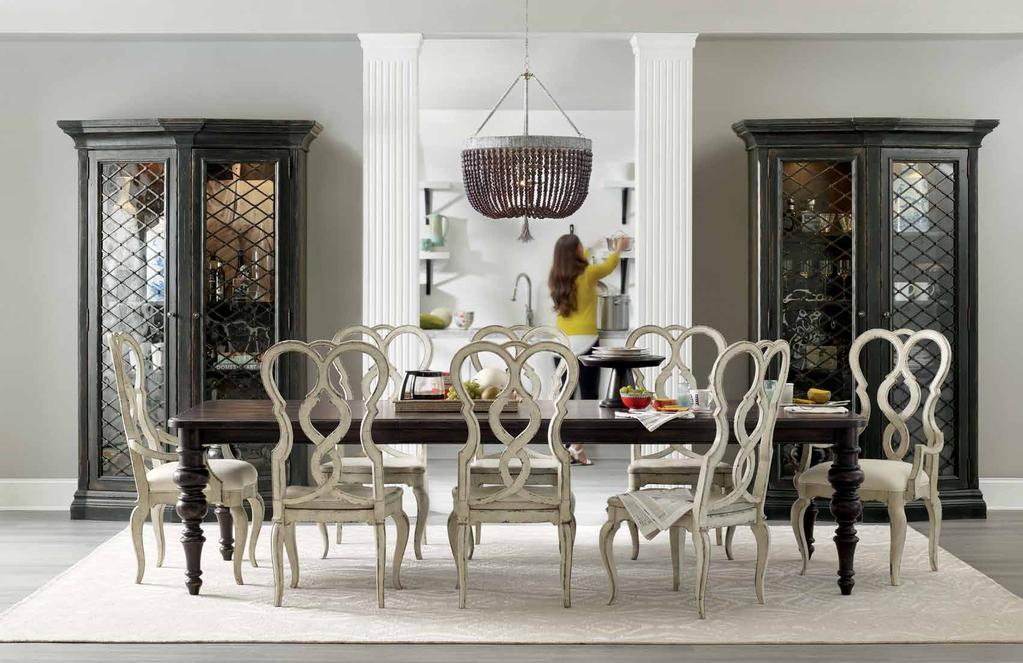 DINING Create a focal point with the Auberose display cabinet featuring seeded glass doors and a metal overlay in a lattice design, and create an inviting dining experience with your choice of round