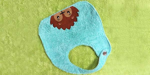 Hand Towel Baby Bib (Stitch-filled Design) Add an adorable look to a soft, absorbent baby bib with sweet embroidery.
