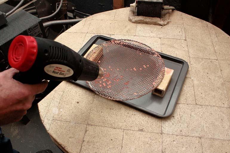 Using a blow dryer to remove film from screen. Applying kiln wash to a screen with ½ inch grid. Different Size Screen The large the grid opening size, the larger the bumps will be.