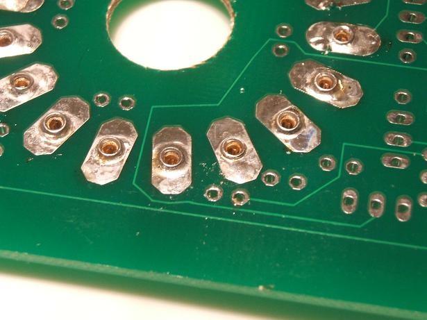 Later the tube can be removed and the top side of the receptacles can be soldered to the upper pads of the pcb to make a mechanically strong tube mount.
