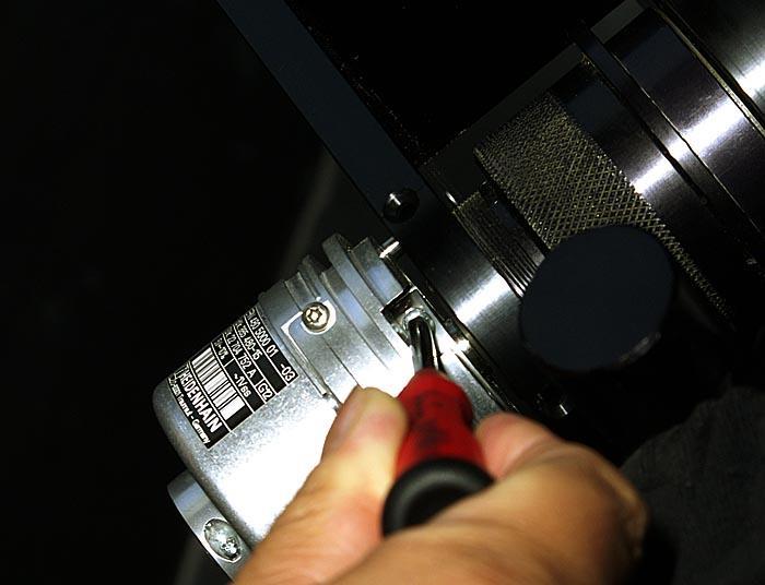 Step 11 Using Torch screw (size #8) tighten two screws well in the clamping ring on both ends of the encoder.