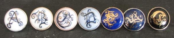 Alphabet on Versailles settings Also available in Monobloc styles Gothic A : Navy & platinum on