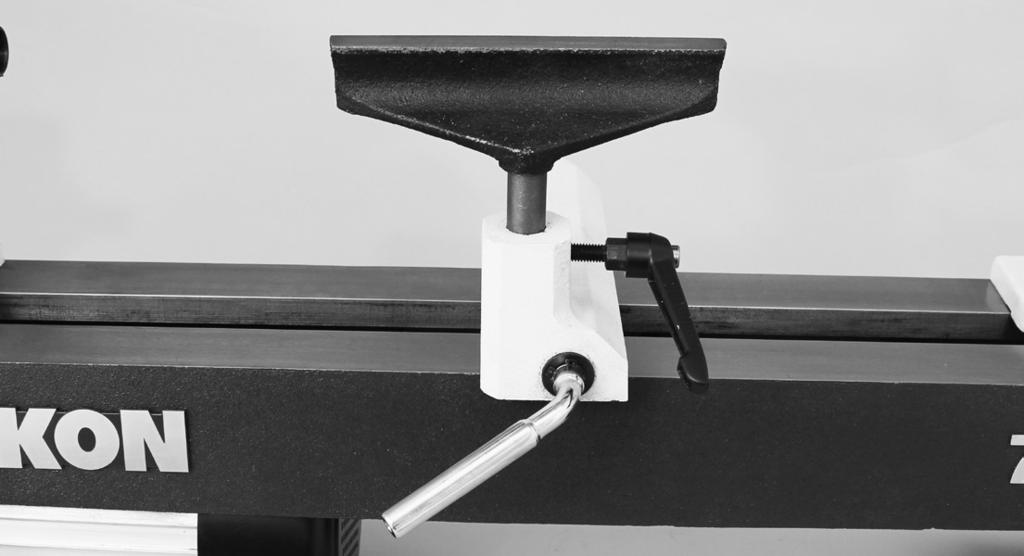 . FIG. INSTALL THE TOOL REST BASE. Remove the tailstock assembly from the lathe bed.