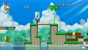 Stomp the Koopa to the right and kick it off the ledge towards the coin to