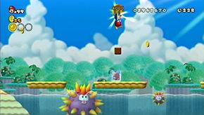 Run towards the giant urchin on the surface of the water and leap somewhat early so you
