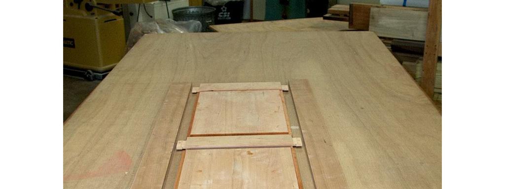 After routing the groove, mortises are formed in the styles.