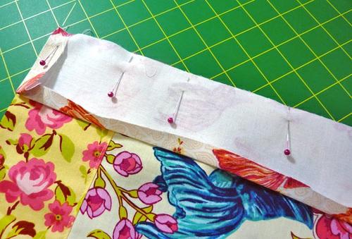 8. Adjust the fold at the bottom of each front facing so the