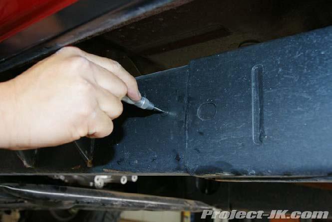 10. With your LoD Signature Series Rock Slider set aside, locate and mark the center