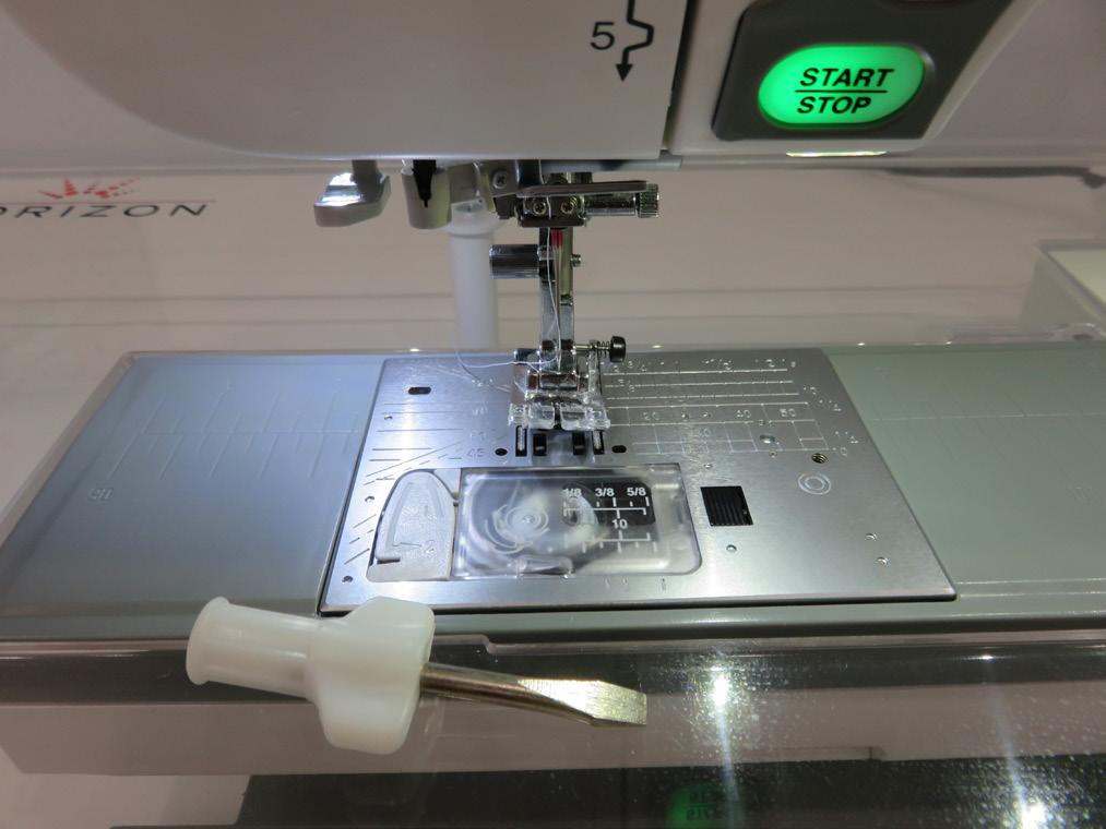 4. Remove the QBS foot for free motion and attach the standard sewing foot A.