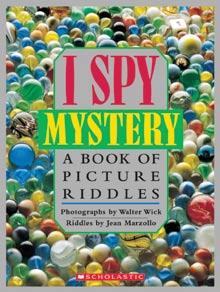 Easy riddles by Jean Marzollo are paired with extraordinary photographs by New York Times-bestselling author Walter