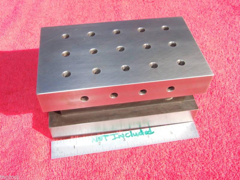 BLOCK MEASURES 2.9675" TALL X 3.460" WIDE X 5.953" LONG. GRIND CUBE OR BLOCK HAS (15 ) TAPPED 1/4" X20 HOLES IN TOP PLATE AS SHOWN.