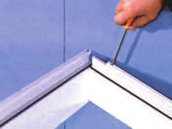 Fit brackets into slots in ridge (pre-cut), slide rafter onto