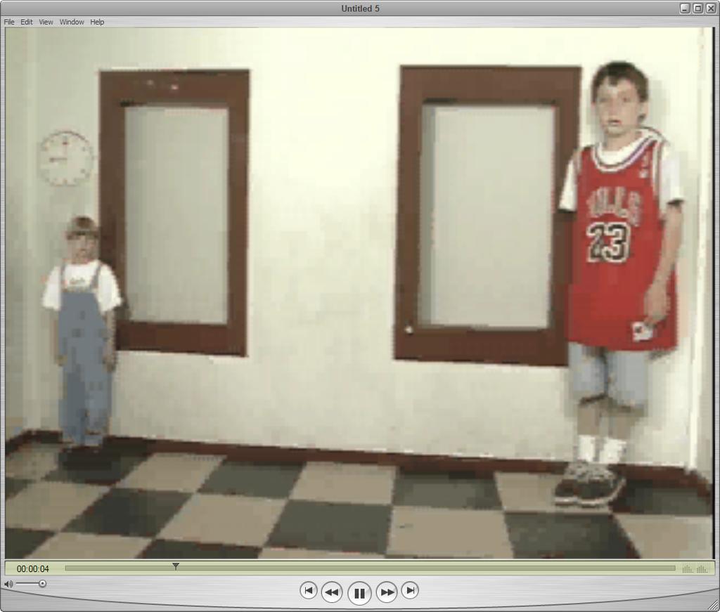 The Ames Room Click on play bu.on to launch video in QuickTime player.