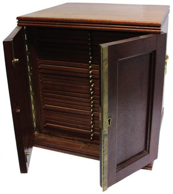 4090 4092 4090 A Modern Mahogany Coin Collector s Cabinet, by Nichols, 300mm x 302mm x 305mm, with double panelled doors (lock, no key), carrying handles, containing 26 trays, to hold coins of
