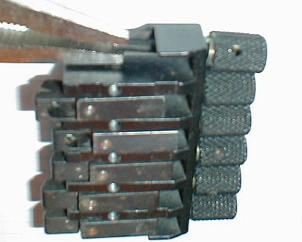 It is recommended that you use a pair of vice-grips, set loosely, along with a piece