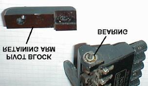 Each Pivot Block Retaining Arm acts as the outer race for a TransTrem Bearing and one washer (referred to as the Outer Washer). Make note of the location of this washer for use during re-assembly.