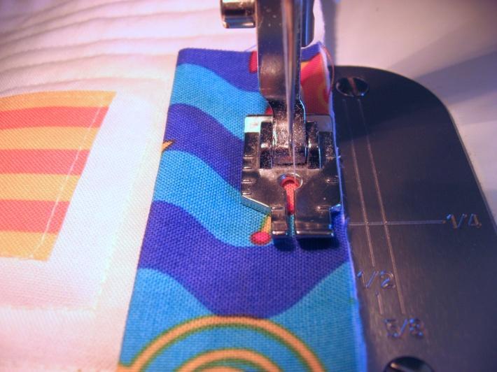 attached to the front of the quilt using a ¼ seam