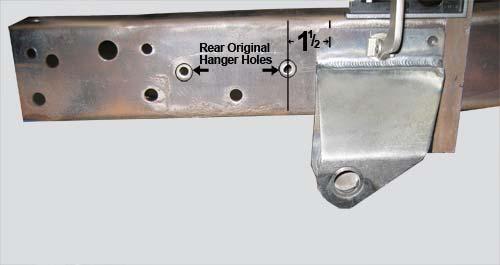 the bottom tab and through the frame and cross-member lower flange with the nut and washer on the inside of the frame rail as pictured in lower left picture. Note: Driver s side bracket shown. 6.